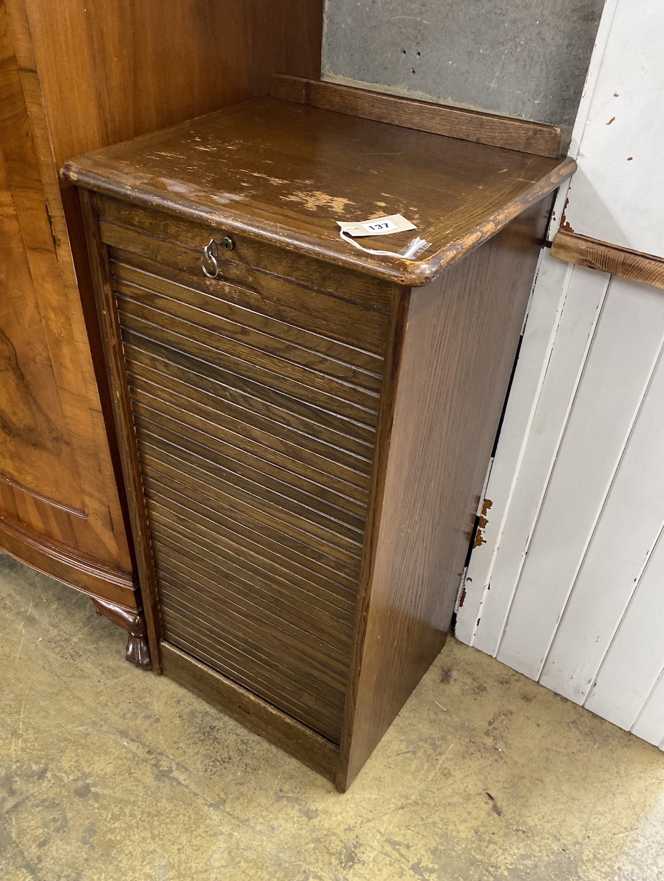 A mid century oak tambour filing cabinet, width 46cm, depth 40cm, height 93cm